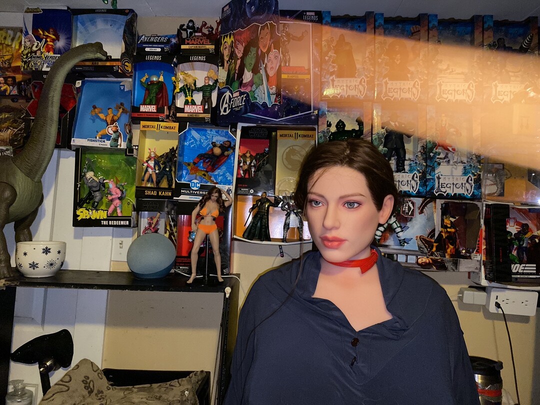 lady and her doll, and action figures.JPG