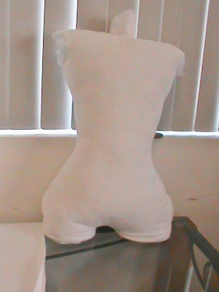 Doll building starts with a solid torso, which affects how I design the limbs and features.