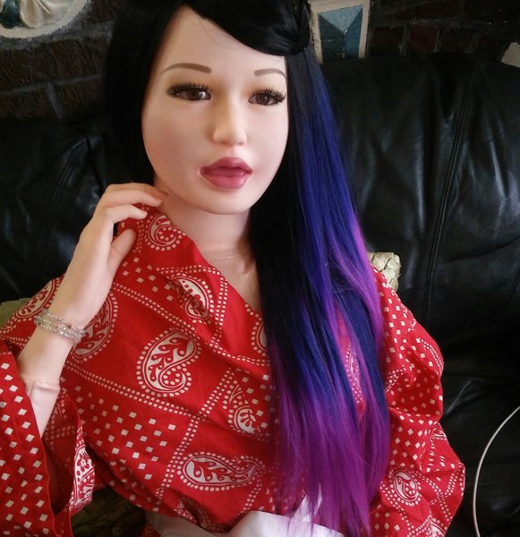 Wearing a gorgeous light weight custom wig for air dolls