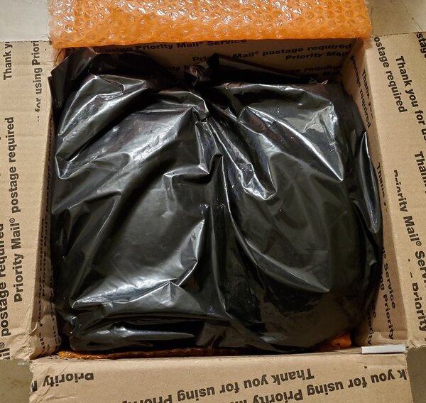 Securely Packaged in Black Plastic Bag