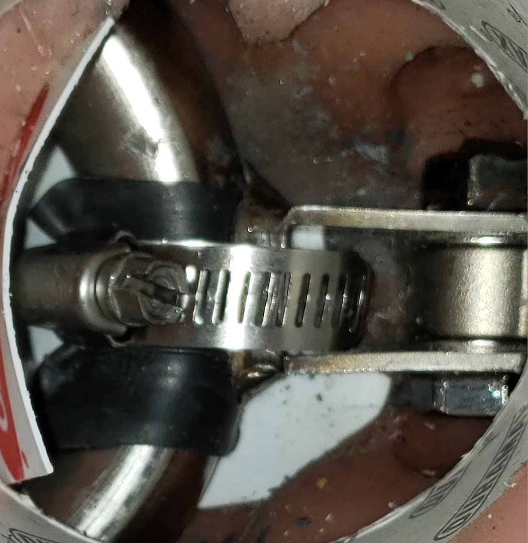 Hose clamp connecting the upper and lower body. See the rubber tube wrapped around the hip tube.